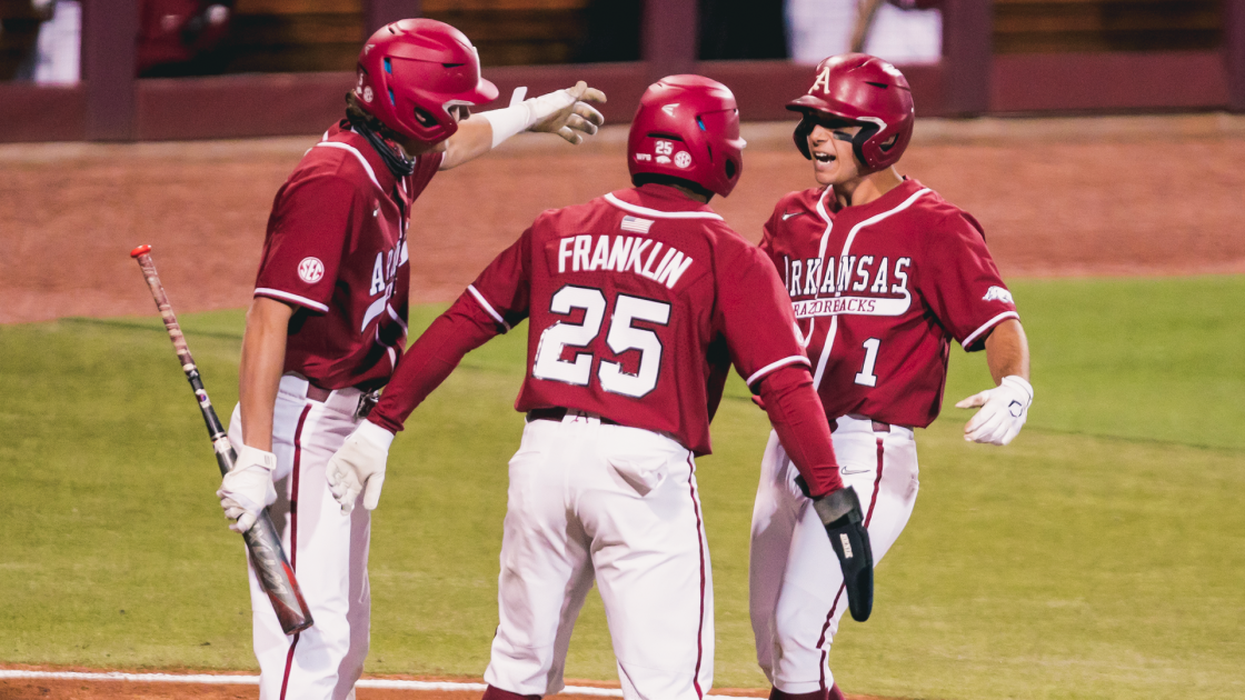 Moore Hammers Two Homers, Hogs Hurl Two-Hitter in Series-Opening Win - Vimarsana News