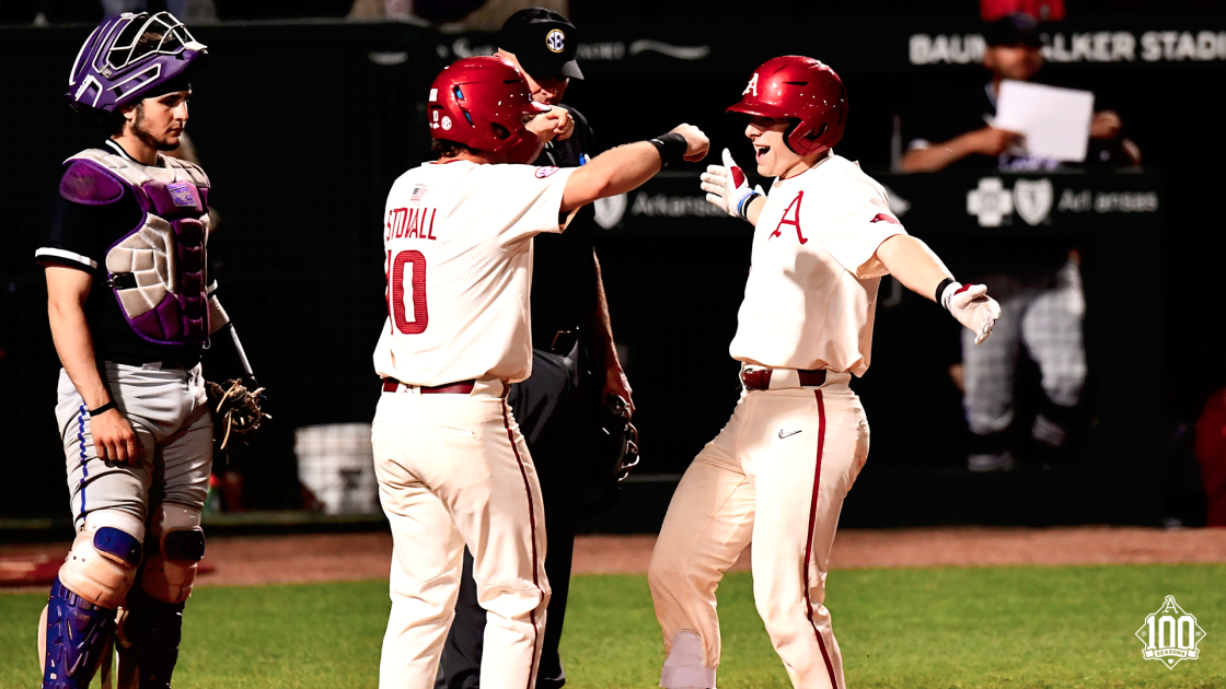 Former Razorback Kevin Kopps cheering hard for former team