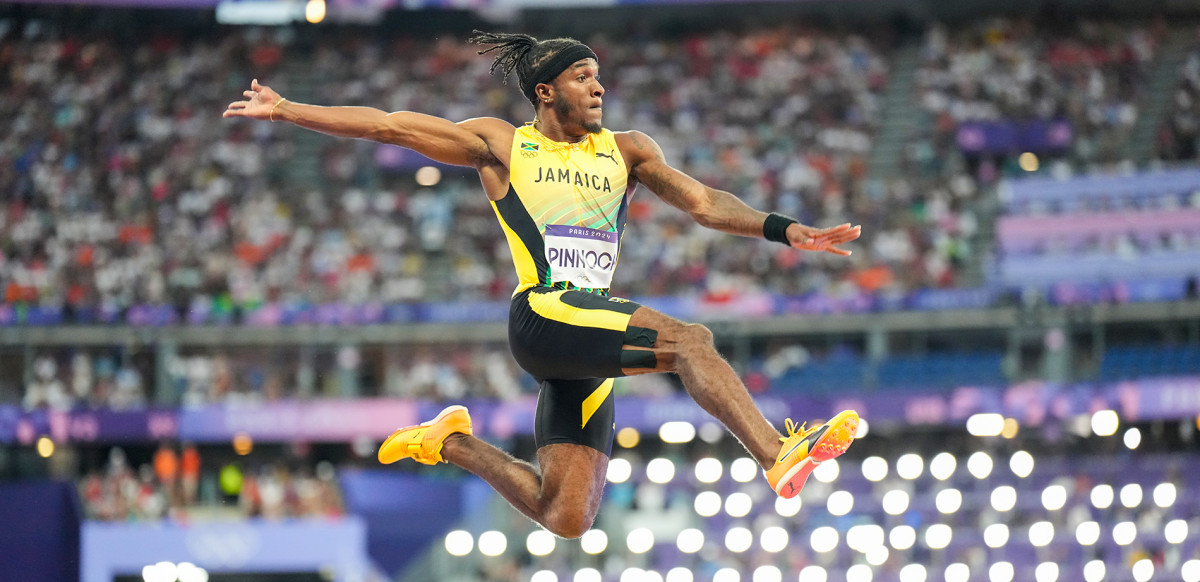 Razorback Wayne Pinnock claims Olympic long jump silver