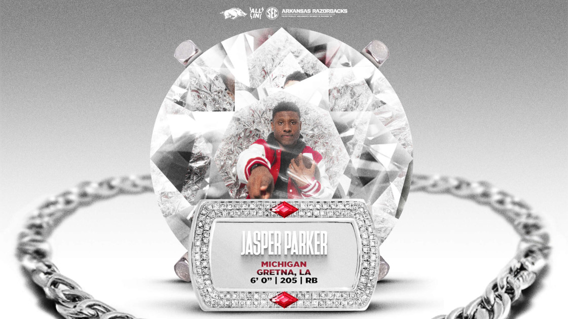 Michigan RB Parker picks Hogs