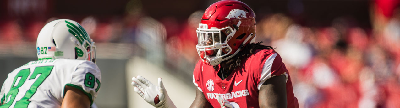 WholeHogSports - Troubled childhood did not define McTelvin Agim