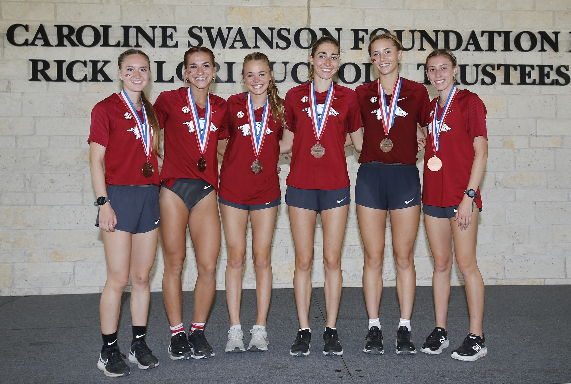 Arkansas claims 11th consecutive region title, Van Camp secures individual  win