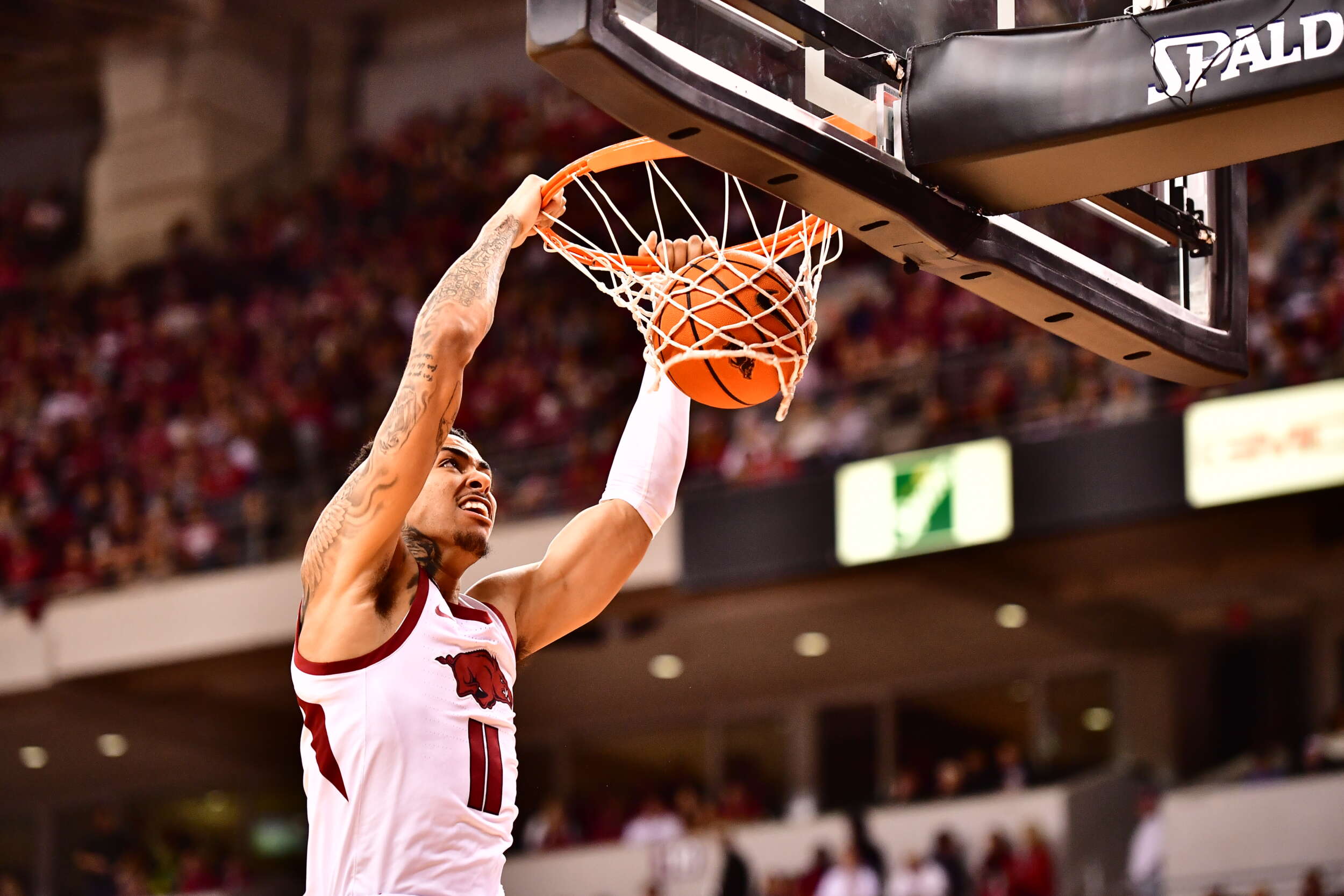 Arkansas Holds on for 6966 Victory Over Arkansas Razorbacks