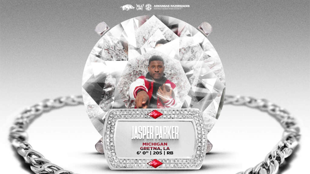 Michigan RB Parker picks Hogs