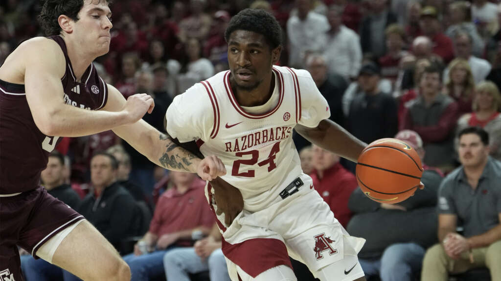Hogs handle Aggies, 99-84
